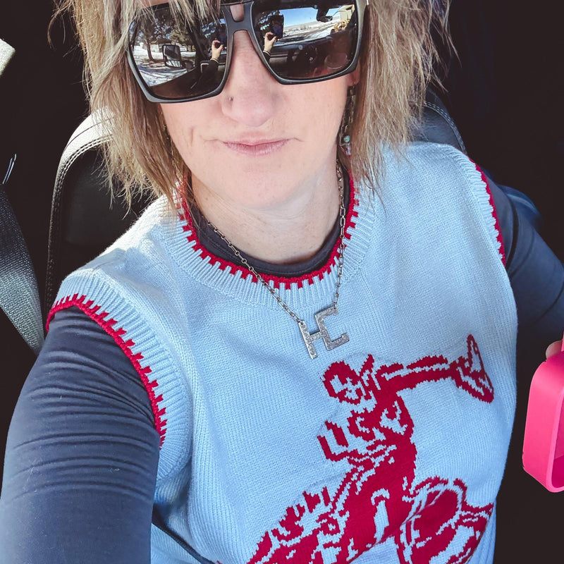 Hats off to the Cowboy Sweater Vest